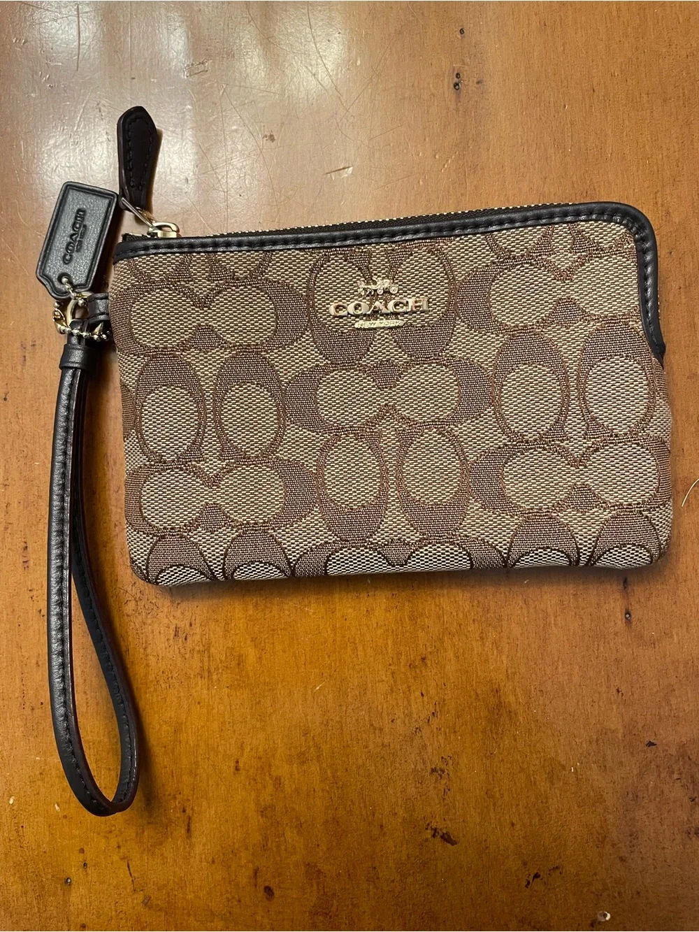 Coach corner zip Wristlet in signature jacquard khaki brown